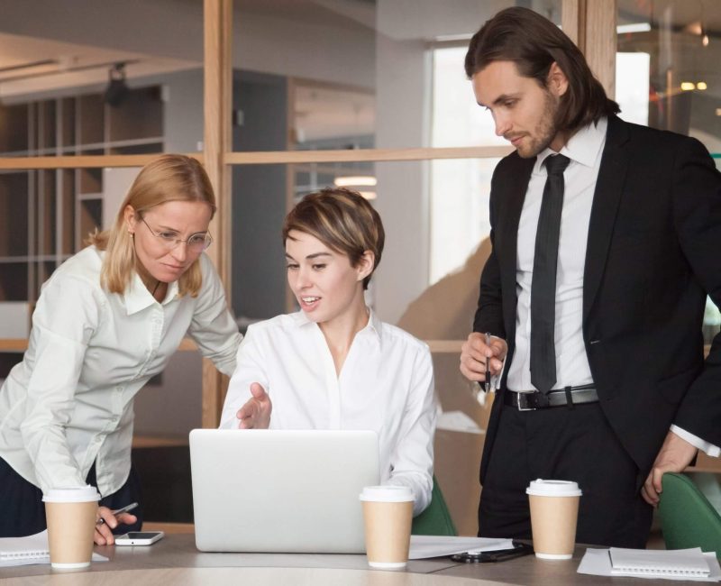 business-partners-negotiating-about-strategies-using-laptop-scaled